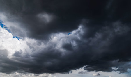 Dark sky with stormy clouds. Dramatic sky rain,Dark clouds before a thunder-storm.