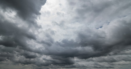 Dark sky with stormy clouds. Dramatic sky rain,Dark clouds before a thunder-storm.の写真素材