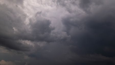 Dark sky with stormy clouds. Dramatic sky rain,Dark clouds before a thunder-storm.の写真素材
