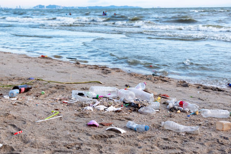 Dirty sea sandy shore ,Environmental pollution,
Plastic water bottles pollution in ocean (Marine...