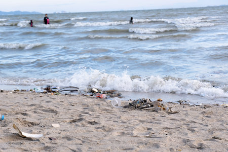 Dirty sea sandy shore ,Environmental pollution,
Plastic water bottles pollution in ocean (Marine...