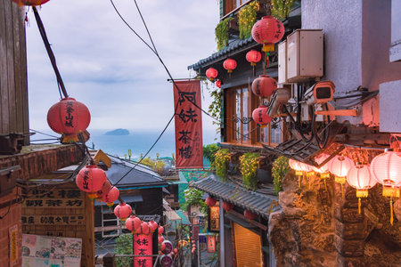 Jiufen Old Street is a narrow, winding alleyway with shops, teahouses, and restaurants that offers tourists a view of traditional Taiwanese life.の写真素材