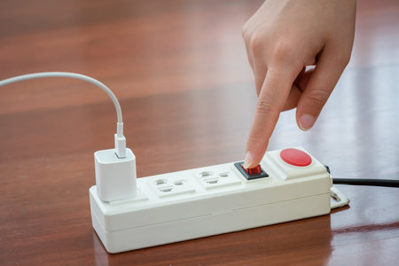 plugging or unplugging electrical wall outlet, save energy, environment protection