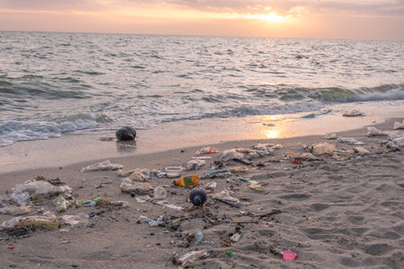 Dirty sea sandy shore ,Environmental pollution,
Plastic water bottles pollution in ocean (Marine debris)の写真素材