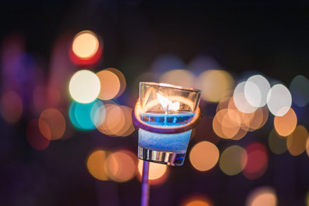 abstract blur candles with lights bokeh background.