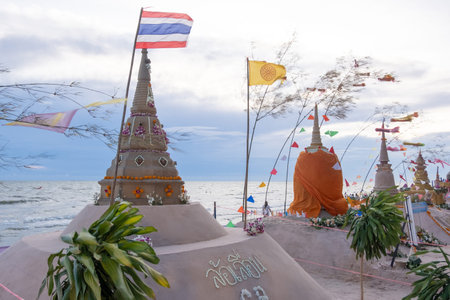 Bangkok,Thailand-March,6:Beautiful sand stupas adorned with prayer flags in Sea during the Water Festival.の写真素材