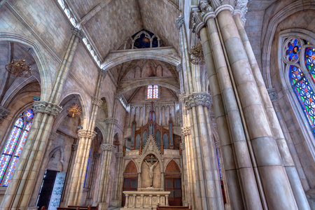 People praying in church benchesの写真素材