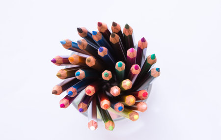 Colorful pencils on white background