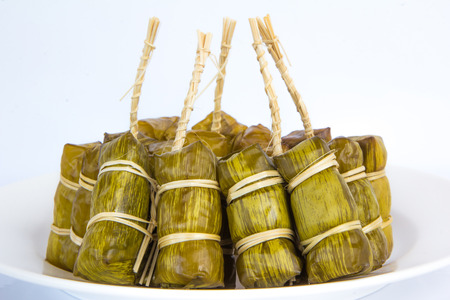 Suman,Thai sticky rice dessert wrapped in a banana leafの写真素材
