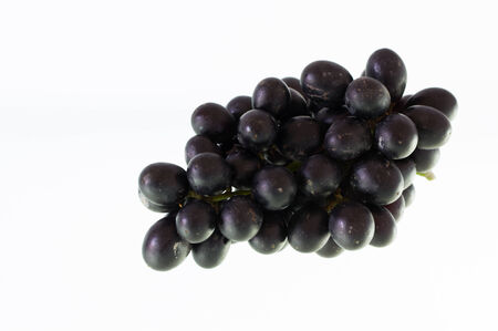 Ripe grapes isolate on white backgroundの写真素材