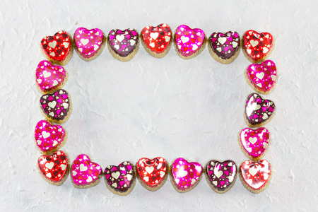 Frame colorful heart patterns on mulberry paperの写真素材