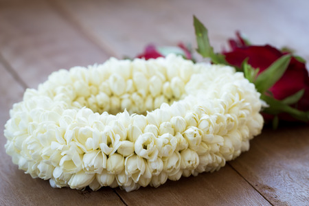 beautiful Jasmine garland on wooden backgroundの写真素材