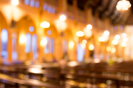 blurred photo of church interior for abstract backgroundの写真素材