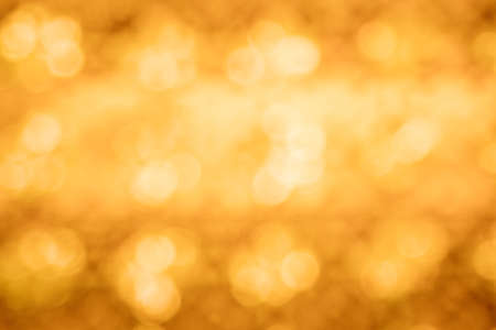 abstract golden bokeh for backgroundの写真素材
