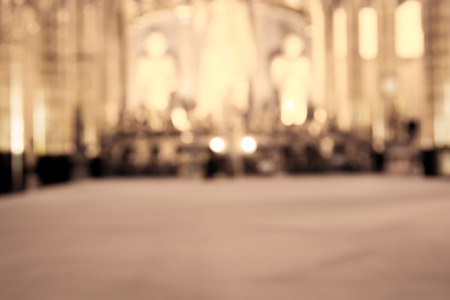 blurred photo of temple interior in vintage filter for backgroundの写真素材