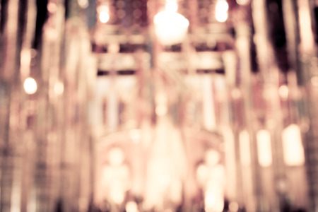 blurred photo of temple interior in vintage filter for backgroundの写真素材