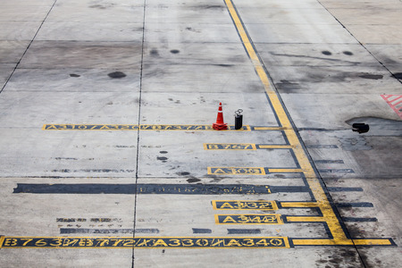 Area Aircraft parking, Yellow taxi line for parkingの写真素材