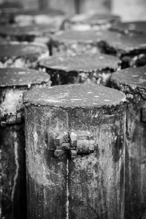 Concrete in steel cylinder formwork for testing of strength compaction in black and whiteの写真素材