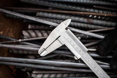 Vernier Caliper, precision measurement tool put on steelの写真素材