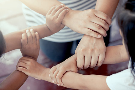 Cycle of family holding hands together in vintage color tone