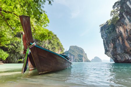 Amazing view from over Thai traditional wooden longtail boatの写真素材
