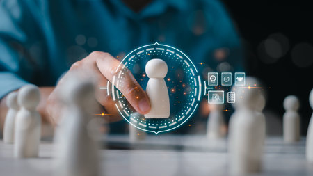 Businessman holding wooden figure with virtual artificial intelligence of business leadership and...