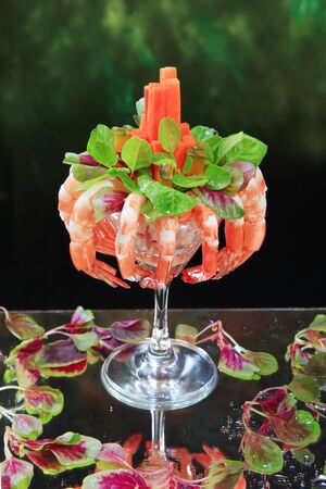 Shrimp and Vegetables on a glass of champagne.の写真素材