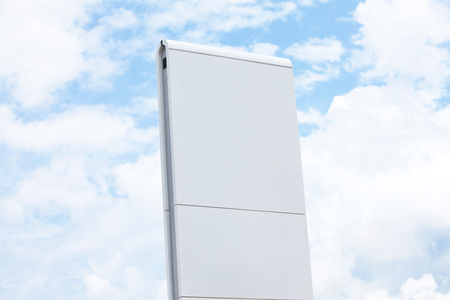 Blank billboard at blue sky background.の写真素材