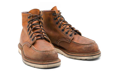 Brown leather boots on white backgroundの写真素材