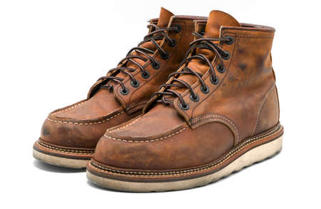 Vintage Brown leather boots on white backgroundの写真素材