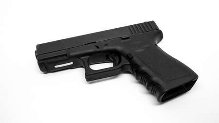 9mm pistol on white backgroundの写真素材