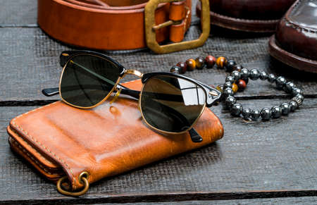 Men accessories, Leather fashion set on wood floorの写真素材