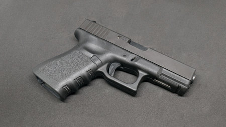 9mm Pistol on black backgroundの写真素材