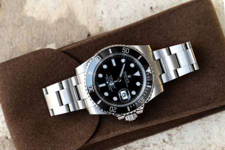 BANGKOK, THAILAND - JULY 14, 2019: Rolex Submariner watch is equipped with a ceramic bezel with...