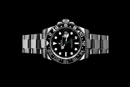 BANGKOK, THAILAND - OCTOBER 14, 2019: Rolex GMT Master II watch is equipped with a ceramic bezel.のeditorial素材