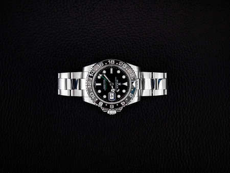 BANGKOK, THAILAND - OCTOBER 14, 2019: Rolex GMT Master II watch is equipped with a ceramic bezel.のeditorial素材