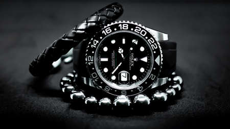 BANGKOK, THAILAND - OCTOBER 14, 2019: Rolex GMT Master II watch is equipped with a ceramic bezel.のeditorial素材