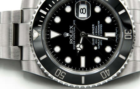 BANGKOK, THAILAND - JULY 14, 2019: Rolex Submariner watch is equipped with a ceramic bezel with functions used in diving.のeditorial素材