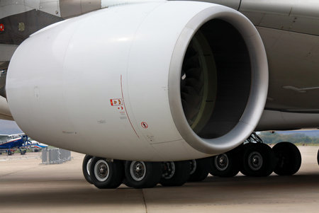 Turbine of the big passenger plane placed on a pole of a wing