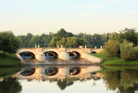 Dam through a pond among the trees in old time Russian estate  Tsaritsynoの写真素材