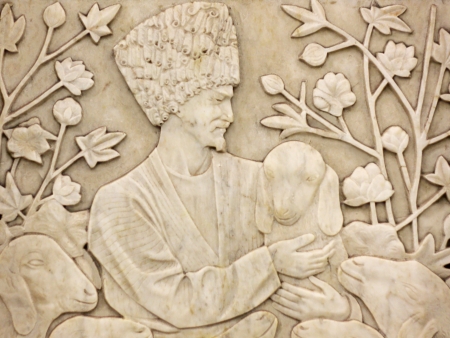 Genre drawing on the white stone carved with the image of man and domestic animalsのeditorial素材