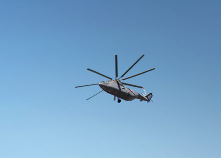 Group of modern militar transport helicopters on the background of blue sky 