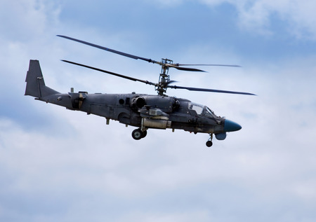 Modern russian attack helicopter Ka-50 on the backgroung of skyの写真素材