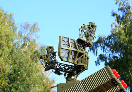 Two containers with missiles and radar antenna of the air defense system
