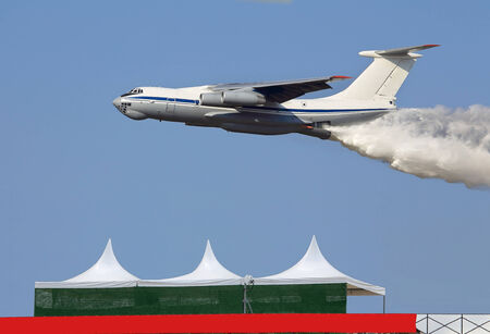 Fire fighting IL 76 P resets the water during the time of flight at low altitudeのeditorial素材