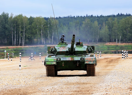 Chinese main battle tank on a march over rough terrain