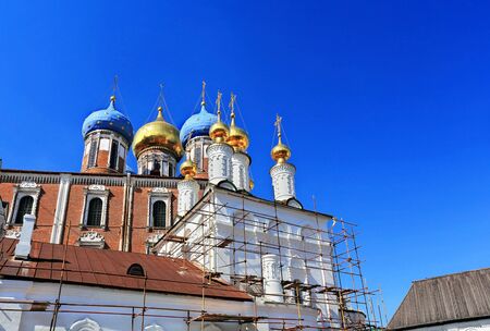 Orthodox church in scaffolding for restorationの写真素材