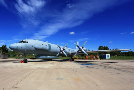 Four-engine piston aircraft on the parking lot at the airbase