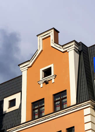 Detail of buildings wall  with yellow-brown ornamentsの写真素材