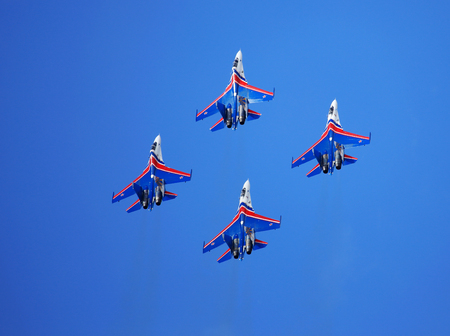 MOSCOW REGION - AUGUST 30: Demonstrative performance of the aerobatic team of Russian military aircrafts "Swifts" at the airshow on August 30, 2015 in Moscow regionのeditorial素材